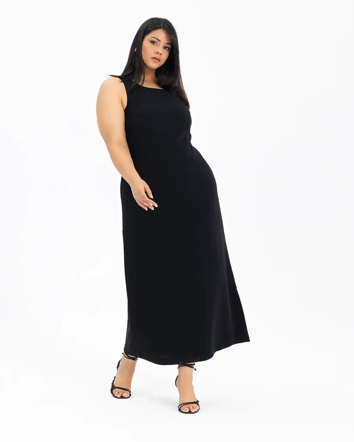 فستان بديك كبير بطانة بدون أكمام بلون أسود بقصة مستقيمة وتصميم كلاسيكي يناسب جميع المناسبات