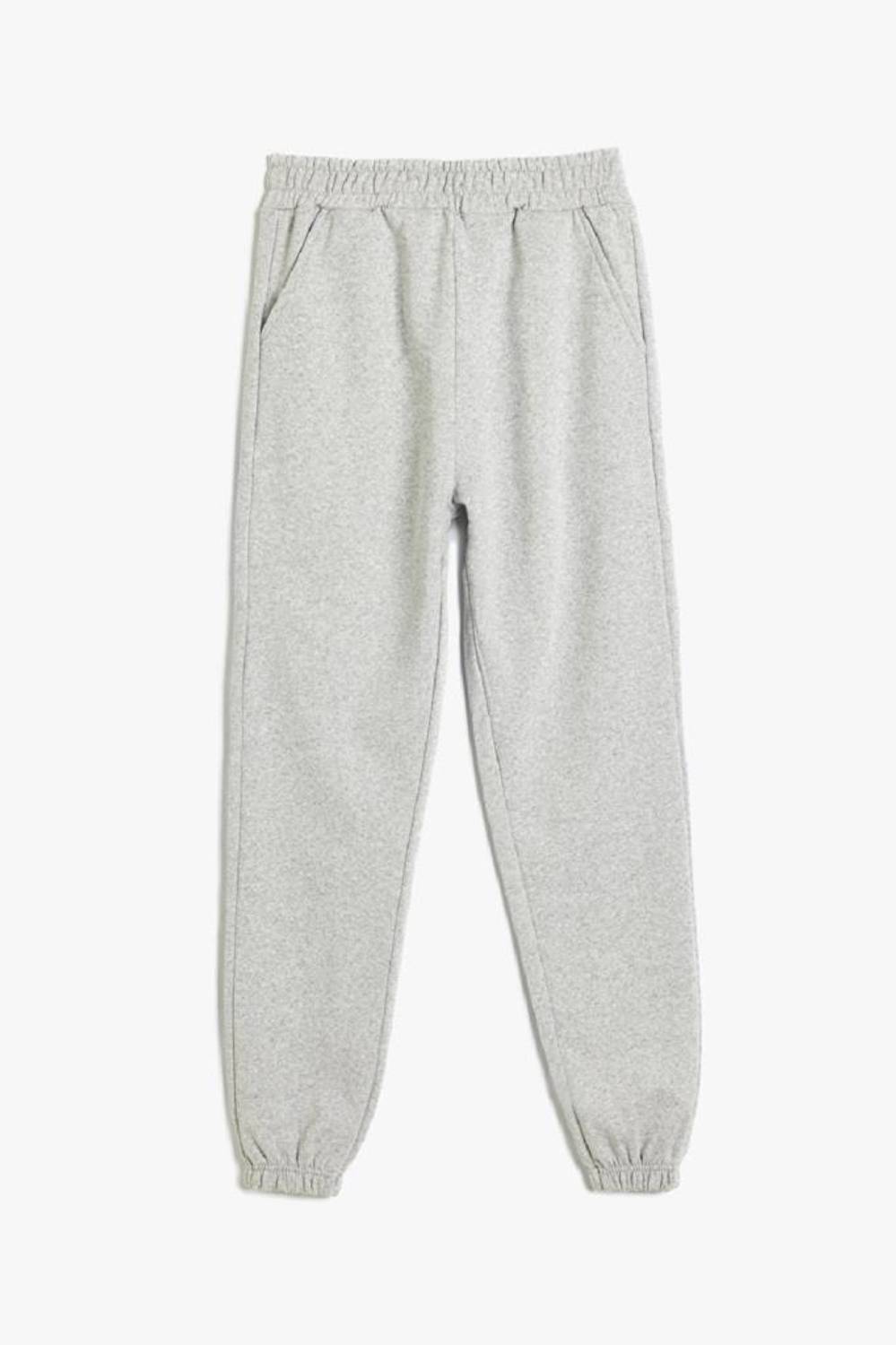 Регулярные брюки для девочек Koton серого цвета с резинкой на талии от 5 до 14 лет