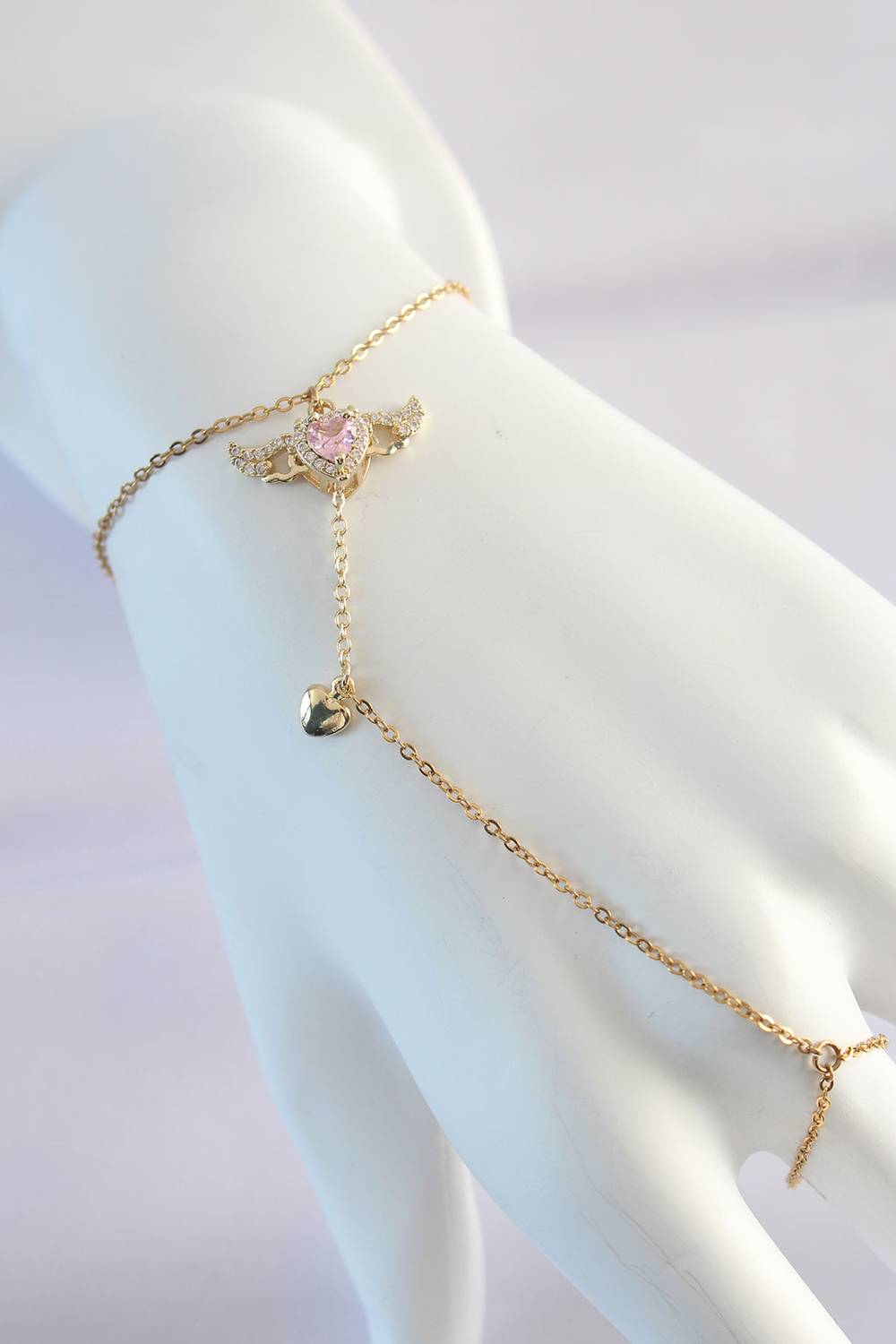 Шахмеран с золотистым цветом и розовыми цирконами в форме крыльев сердца из нержавеющей стали 316L