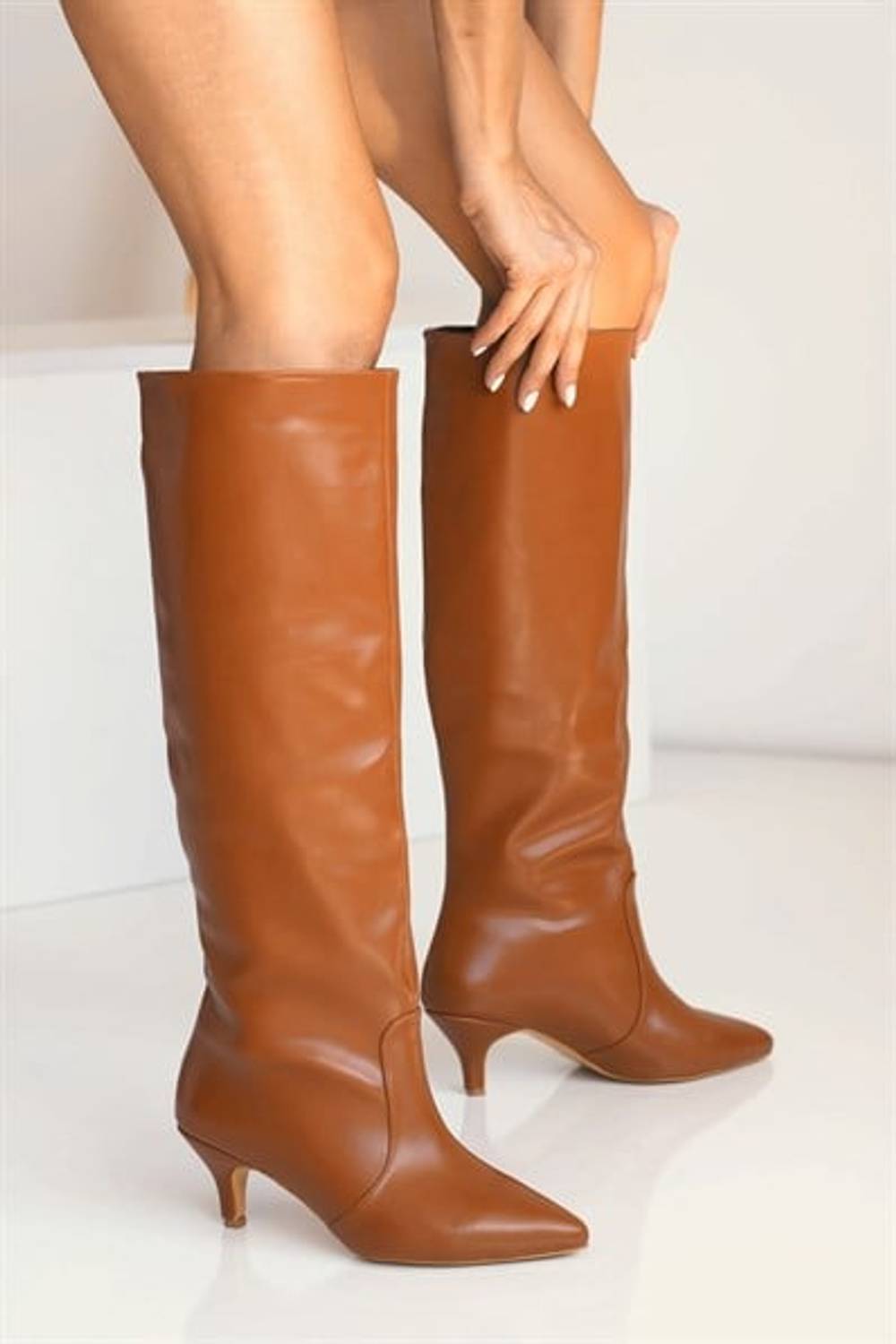 Twisty Taba Women's Heeled Boots