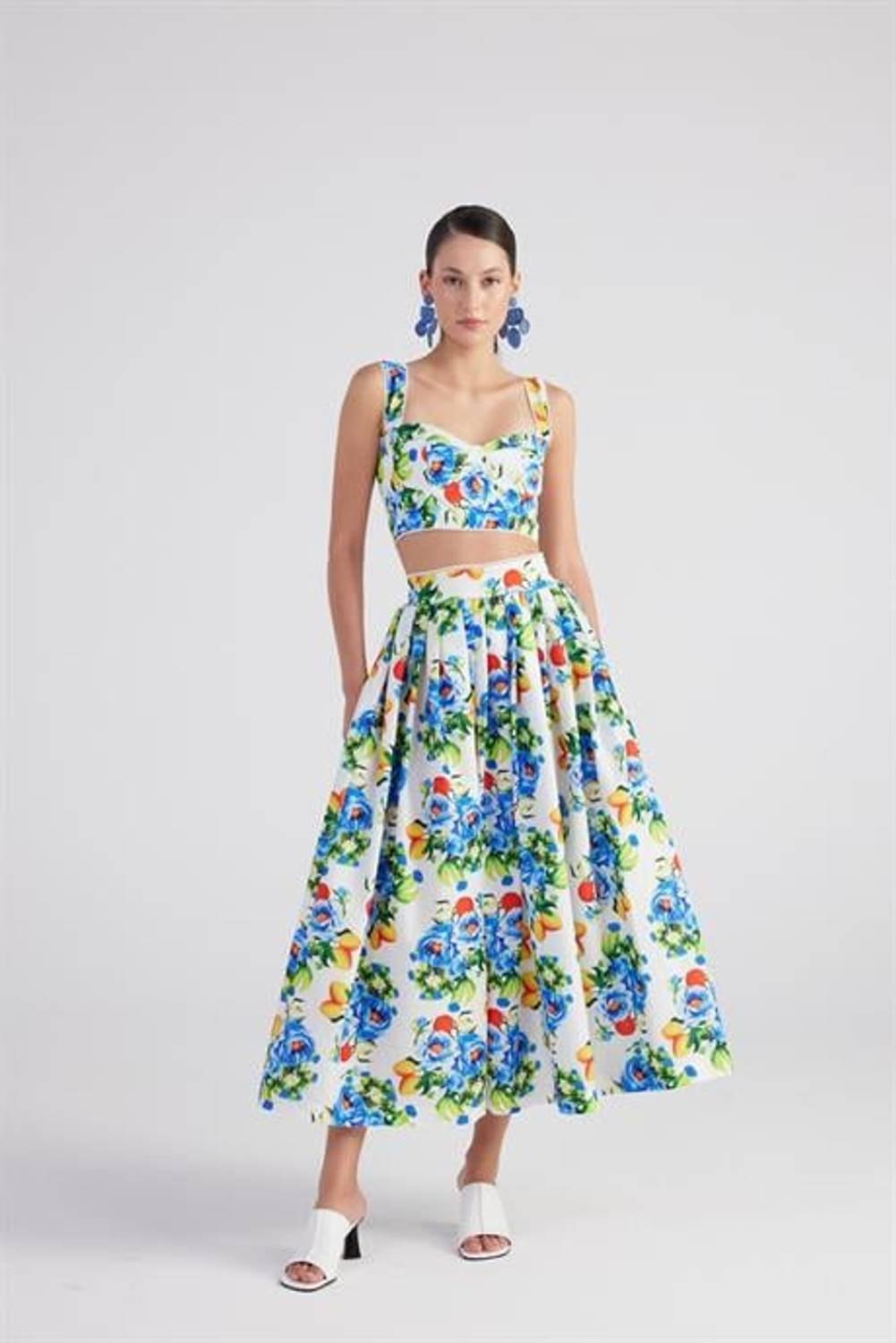 Маркано Равелло длинная юбка синяя с карманами и рисунком, свободная модель для летних вечеров