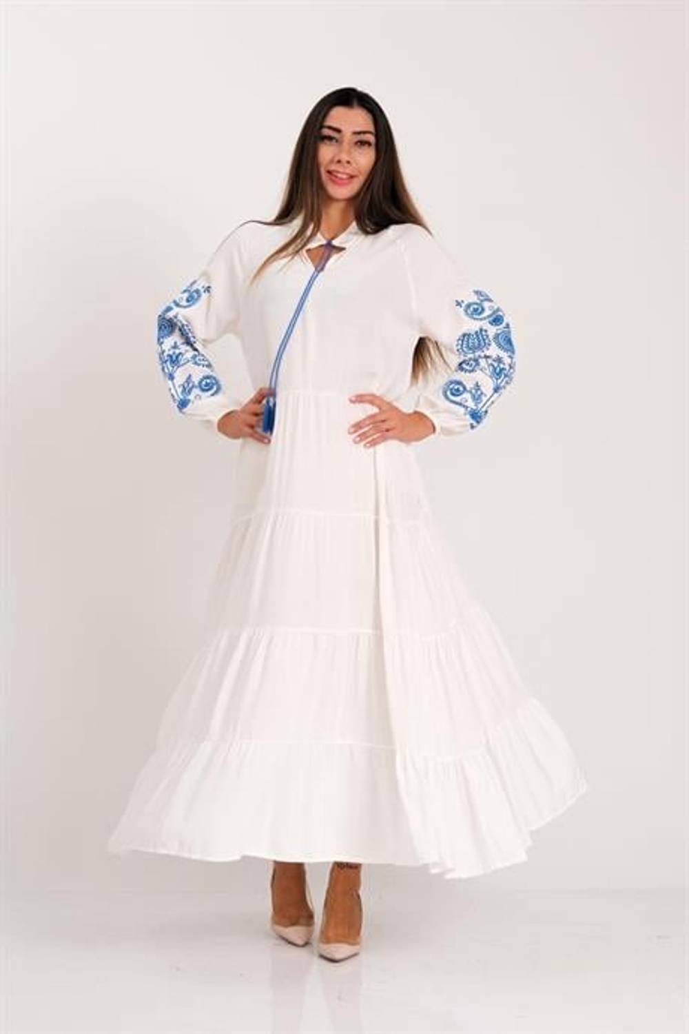 Markano Beyaz Sıfır Yaka Püskül Bağcıklı Kolları Nakışlı Eteği Kat Kat Uzun Elbise