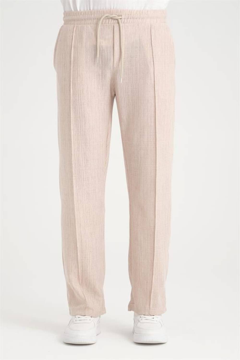 Beige Elastic Waist Baggy Pants with Unique Style and 100% Cotton Comfort