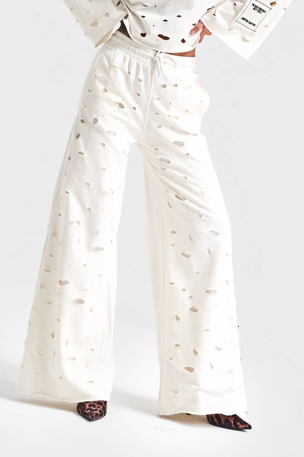 Kadın Ekru Renk Palazzo Fit Yırtık Detaylı Örme Kumaş Tasarım Pantolon