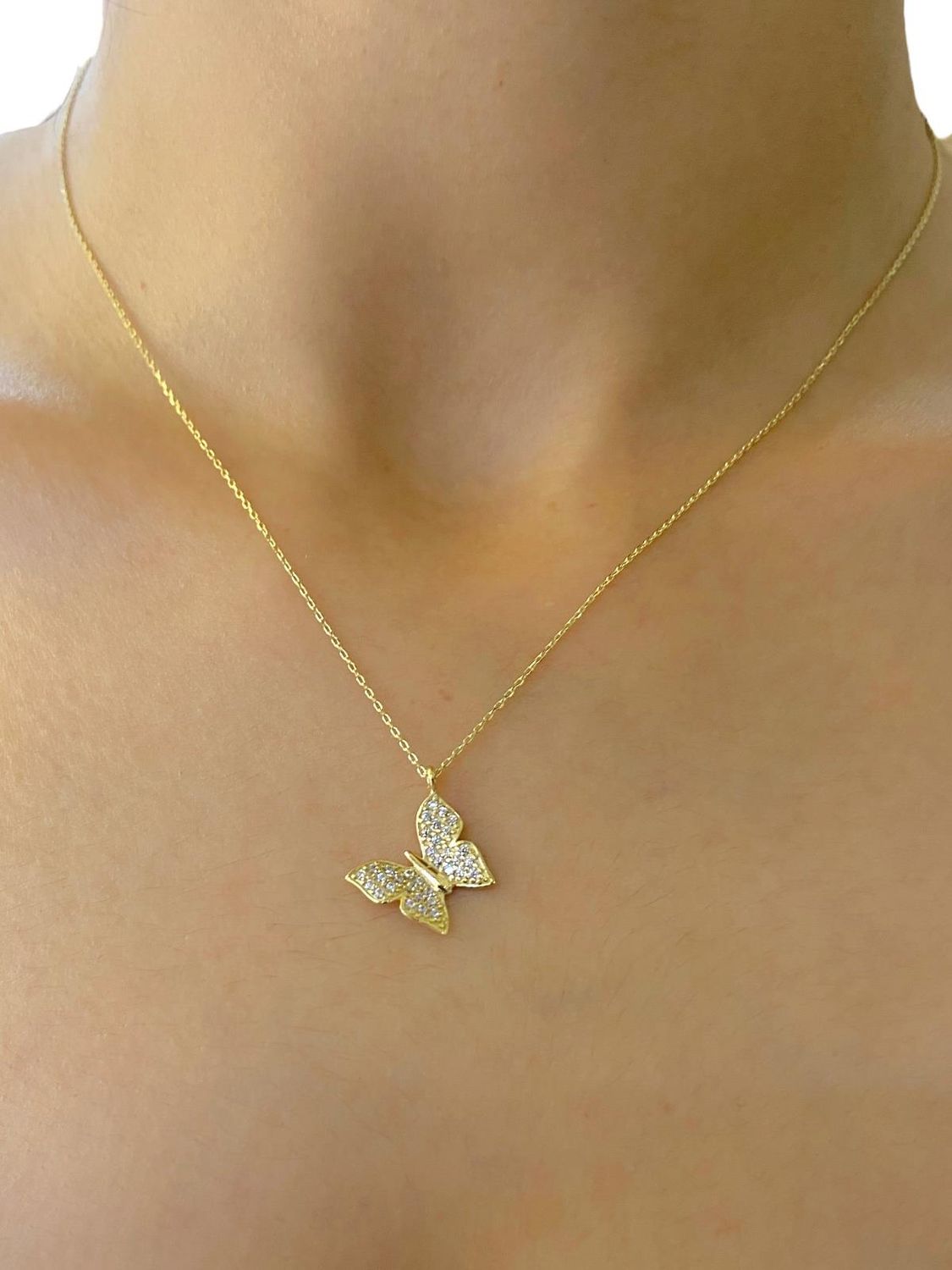 Золотий кулон у формі метелика, 14 карат, вага 1.81 г, з zircon, довжина 42 см, сертифікований, українське виробництво