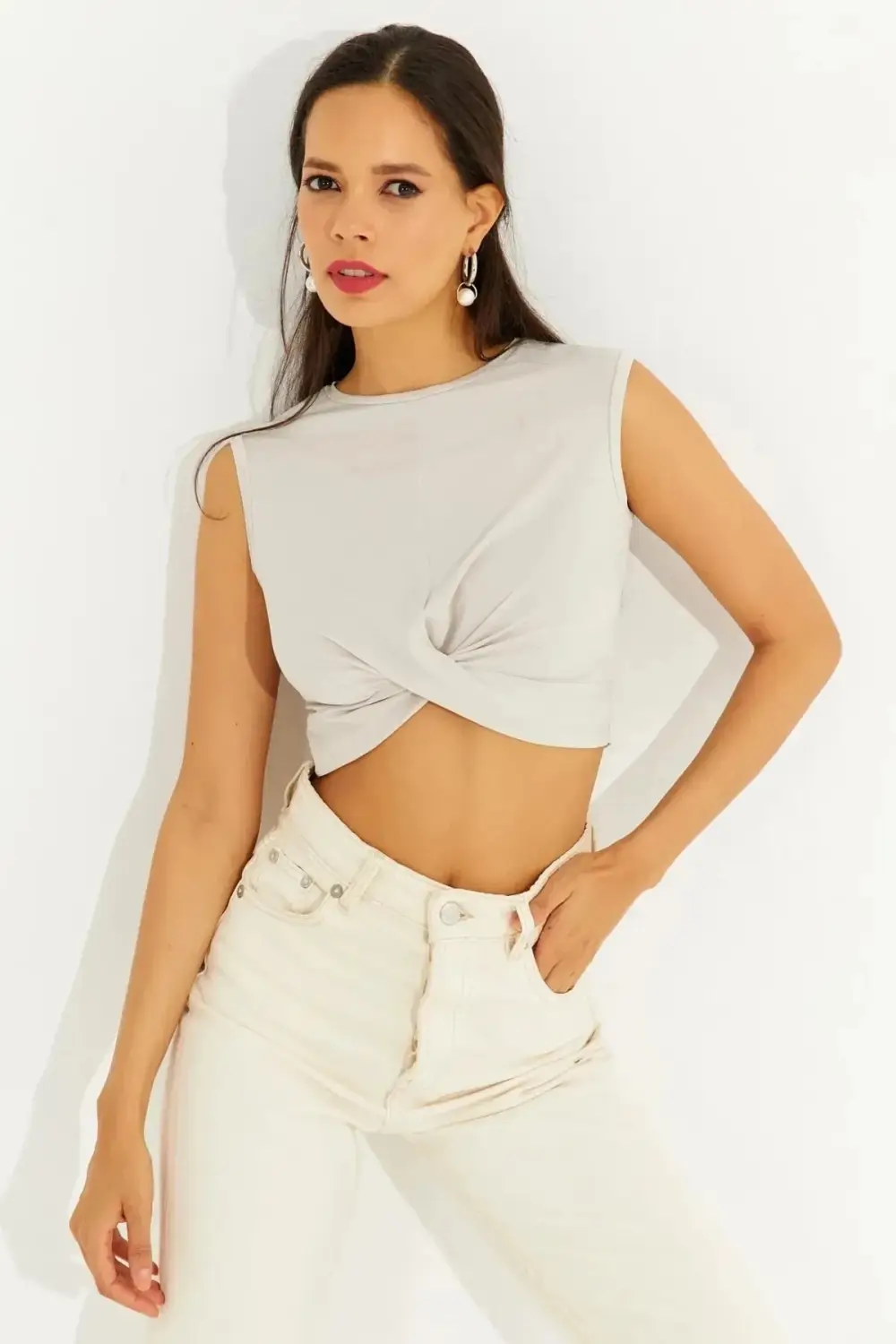 Women's Beige Knotted Front Crew Neck Zero Sleeve Lycra Crop Blouse HZL23S-SND120181