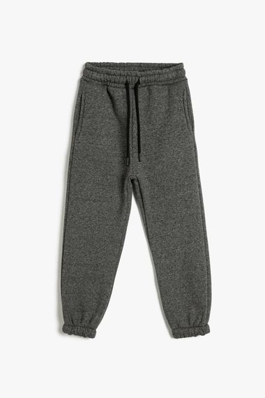 Koton Boy's Basic Jogger Sweatpants with Tie Waist Pocket Drape - photo 1