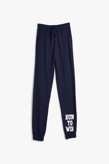 Koton Boy's Jogger Sweatpants with Pocket Tie Waist Slogan Print Detailed - photo 1