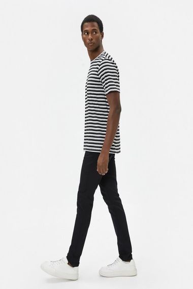 Тонкие джинсы Koton Skinny Fit - Модель Michael Jean, черные, стильный спортивный фасон, низкая талия, идеальны для активного отдыха - фото 2