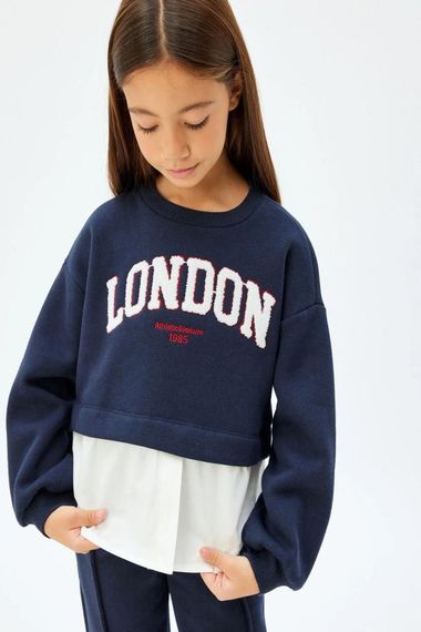 Koton Kız Çocuk Sweatshirt London Şehir Baskılı Bisiklet Yaka Gömlek Etek Ucu Detaylı Şardonlu - fotoğraf 1