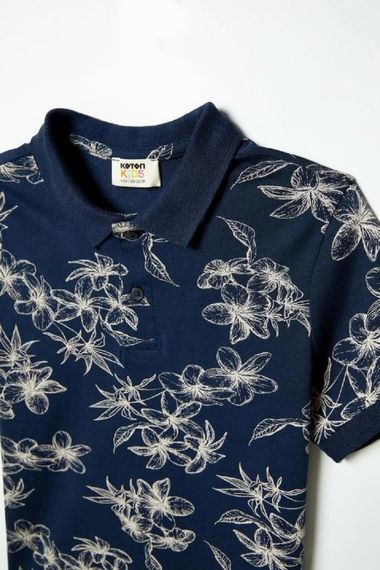 تي شيرت بولو قصير الأكمام للأطفال من كوتون، مزخرف بتفاصيل أزرار، 100% قطن، متوفر بأحجام 5-6، 9-10، و11-12 سنة باللون الكحلي - صورة 3