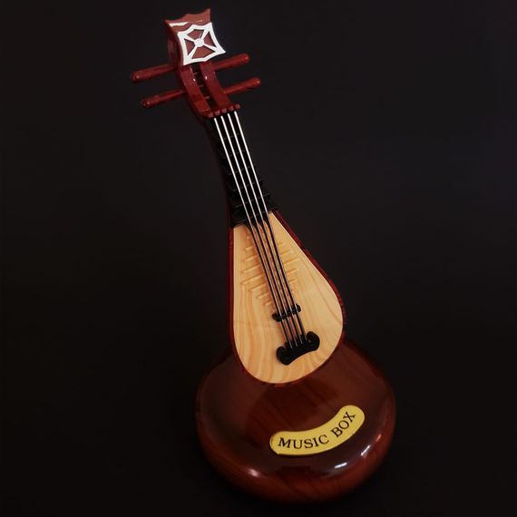 Декоративная музыкальная шкатулка с дизайном Saz, выполненная из качественного пластика, стильный дизайн, размеры 22 X 9,5 см