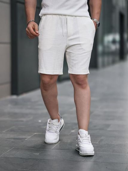 Премиальные белые вязаные шорты с узором, идеальные для повседневной носки и комбинирования с рубашками и джинсами - фото 1