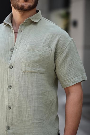 Об oversize рубашка из муслина с одним карманом - светло-хаки, уютный и стильный выбор для повседневного и особого случая - фото 2