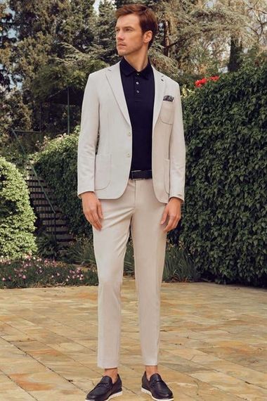 بدلة رجالية رمادية بأزرار بلون موحد وتصميم عصري بستايل ضيق من مرفن مصنوع من البوليستر والفيكسون. - صورة 1