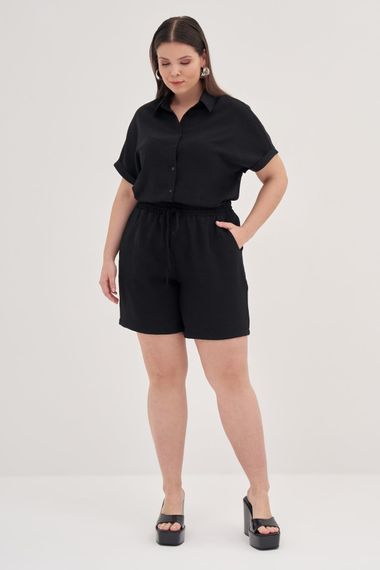 بلوزة قصيرة الأكمام بأحجام كبيرة، تصميم مريح، قماش بوليستر بنسبة 100%، لونها أسود، مثالية للإطلالات العصرية - صورة 5