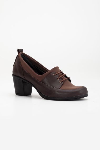 Жіночі коричневі шкіряні туфлі на підборах Ovis з 6 см підбором, зручні та стильні, підходять на повсякденне використання, стійкі до холоду - фото 4