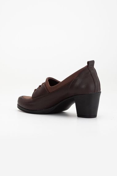 Жіночі коричневі шкіряні туфлі на підборах Ovis з 6 см підбором, зручні та стильні, підходять на повсякденне використання, стійкі до холоду - фото 5