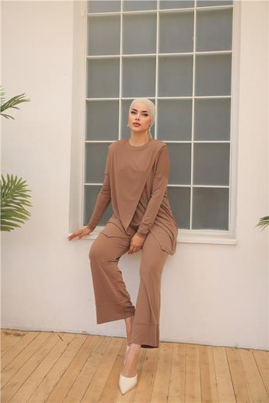 Асиметричний комбінезон для жінок - 71191 - Молочна кави, спортивний одяг, доступні розміри 38-46 - фото 3