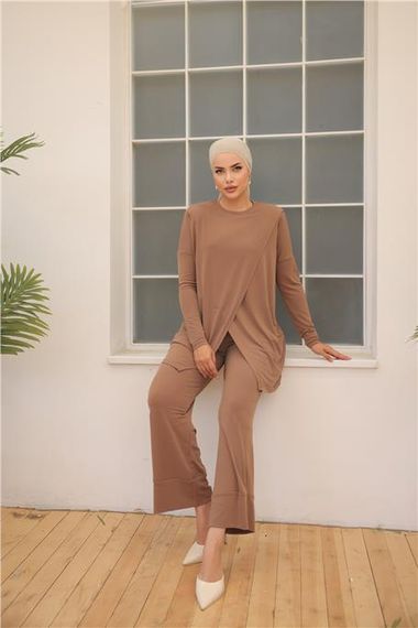 Асиметричний комбінезон для жінок - 71191 - Молочна кави, спортивний одяг, доступні розміри 38-46 - фото 2